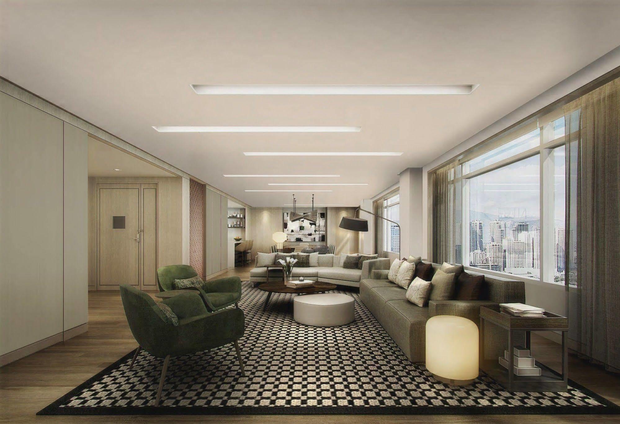 Seda Vertis North Quezon City Zewnętrze zdjęcie The living room of a three-bedroom apartment